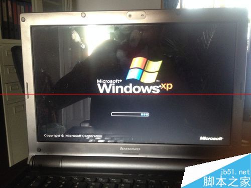 联想天逸f30用ghost安装XP停在Windows开机画面怎么办？