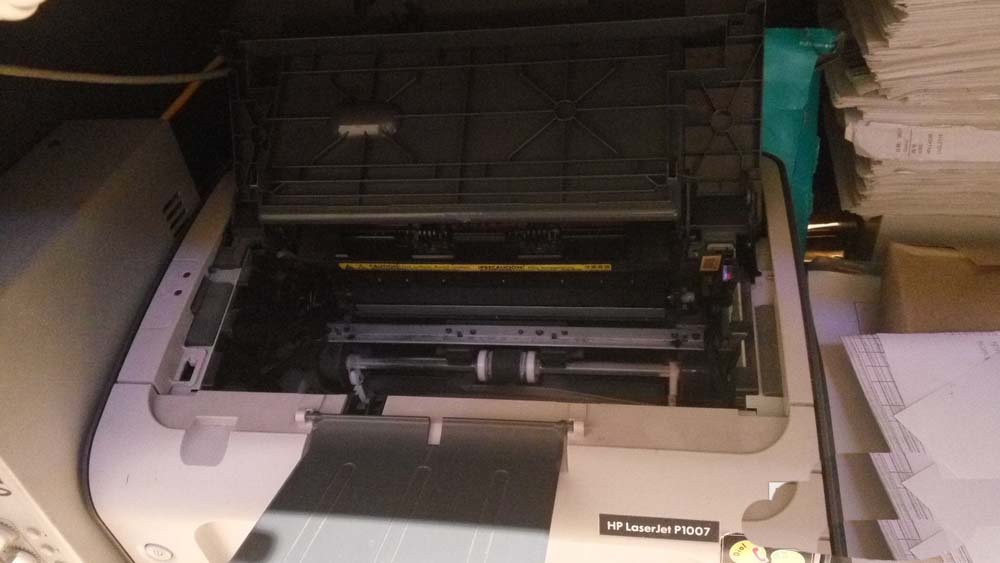 惠普P1007打印机废粉仓怎么清理? 打印机废粉收集器清零的教程